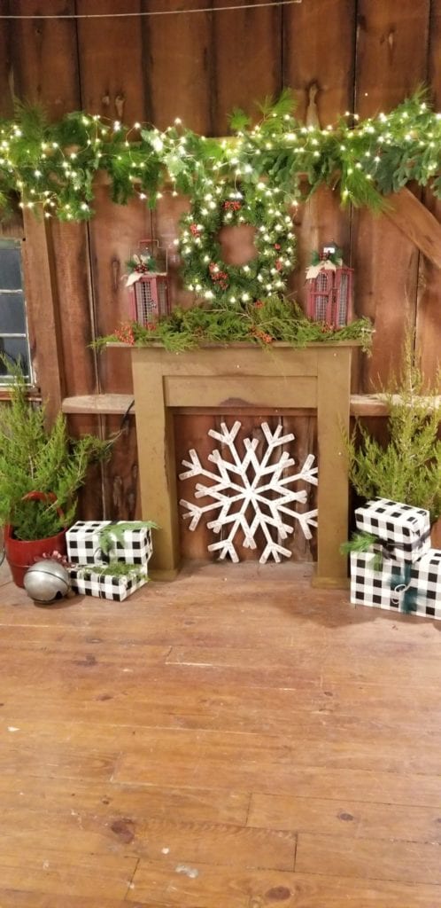 Red barn mantle dressed for the holiday