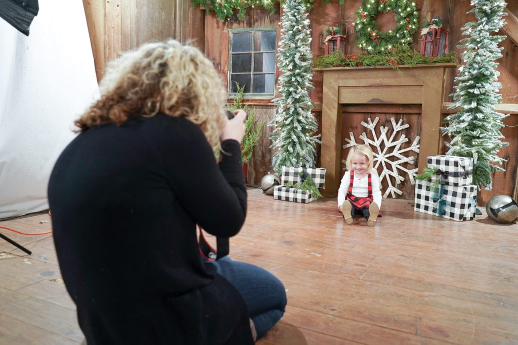 K Artocin photographing a sweet little girl