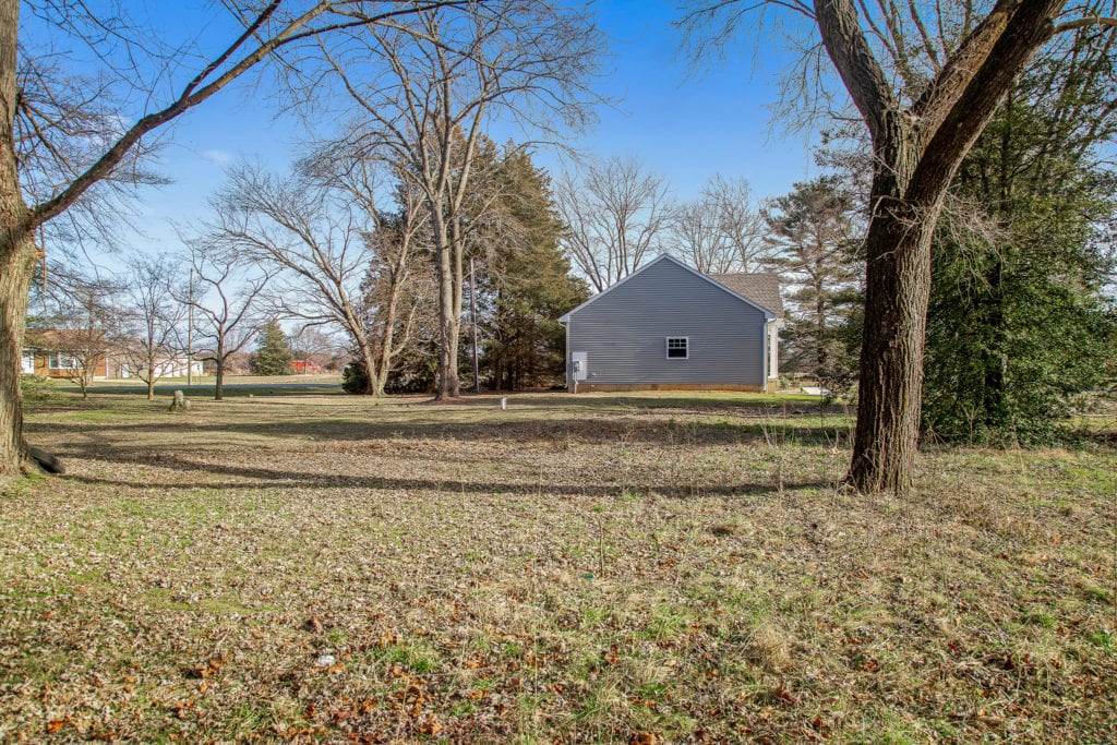 The side yard of 464 Three Bridge RD