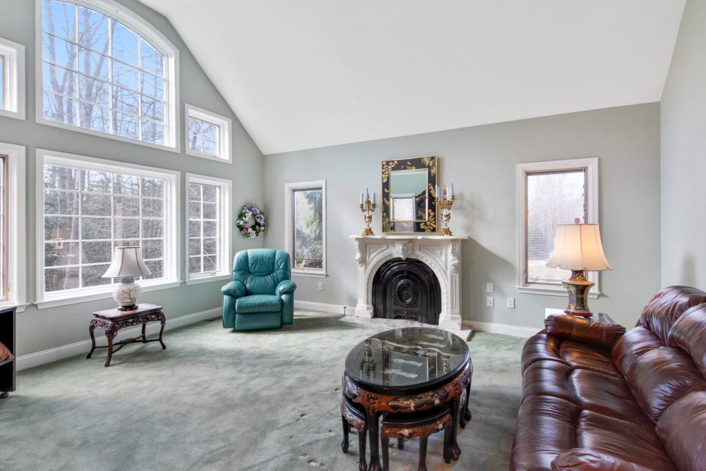 The great room showing windows and mantle