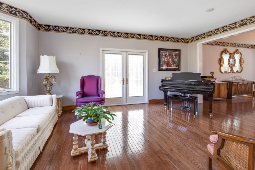 The Formal Living Room with French Doors to the Patio