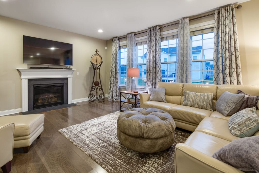 Family room with gas fireplace and mantle