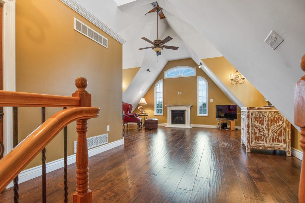 View of the living room from the top of the stairs.