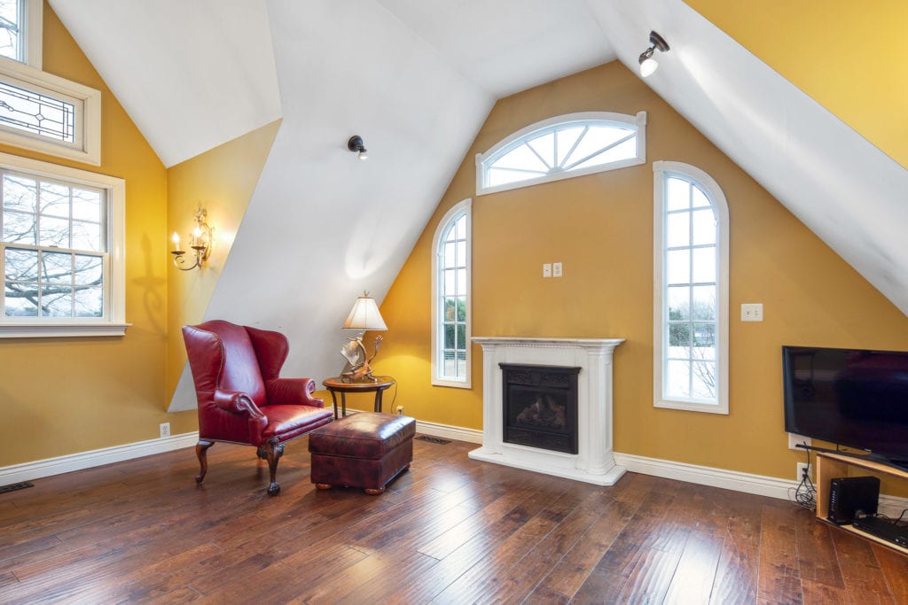 The living room with Gas Fireplace and mantle