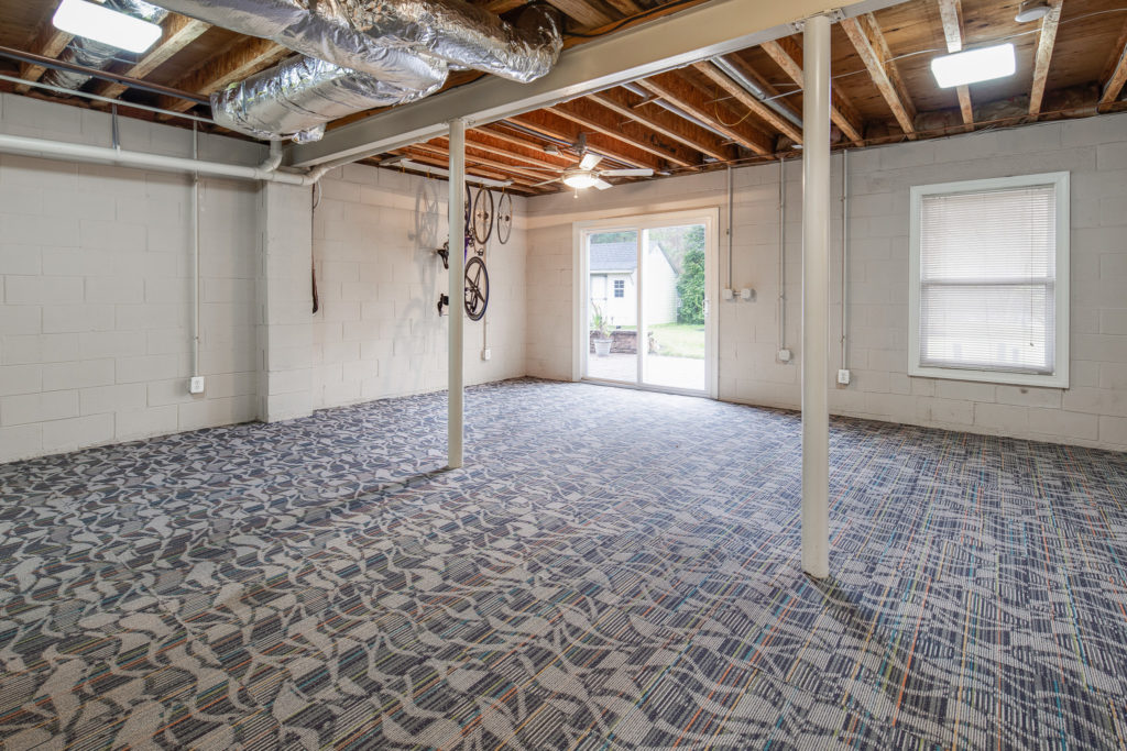 Basement has two sliding glass doors to patio
