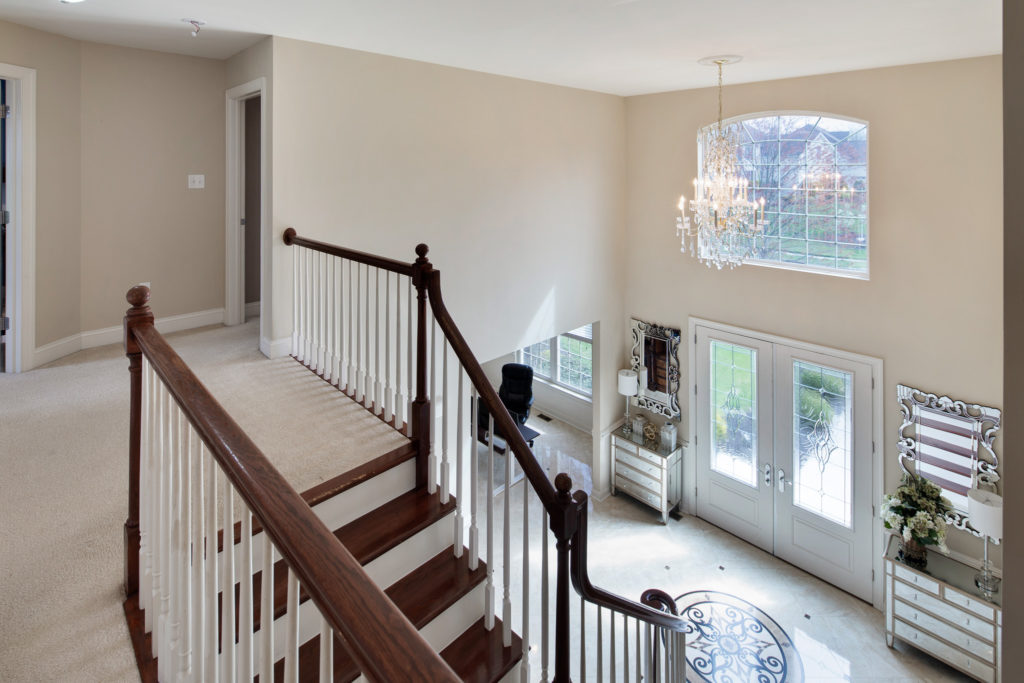 a view of the foyer from the 2nd floor