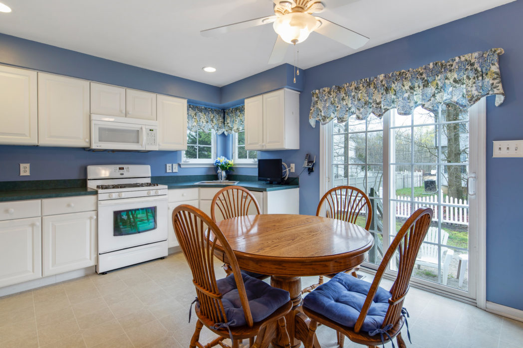 Eat in Kitchen has sliding glass doors to the yard.