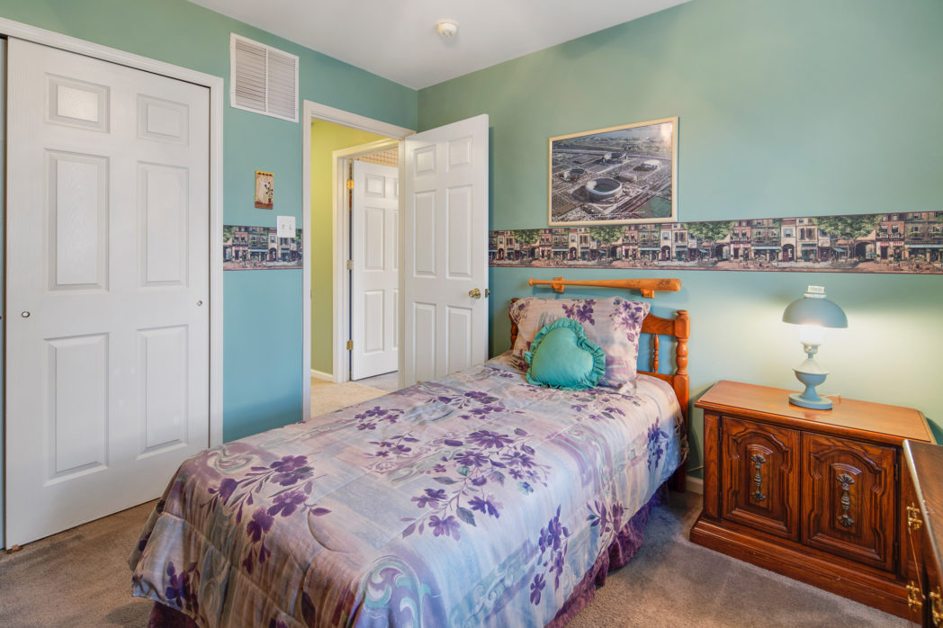 bedroom with light green paint