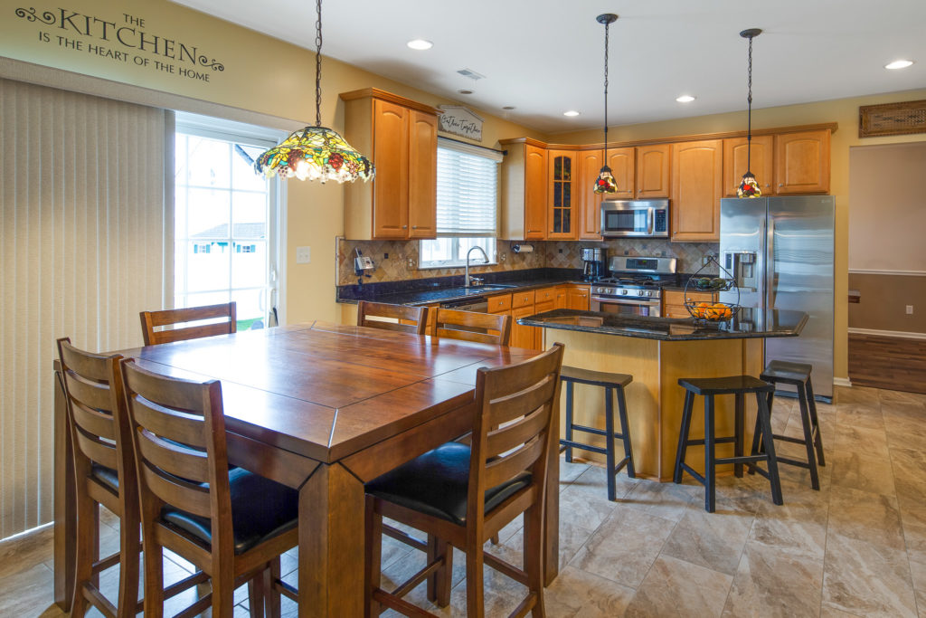 The wonderful eat-in kitchen has access to the patio.