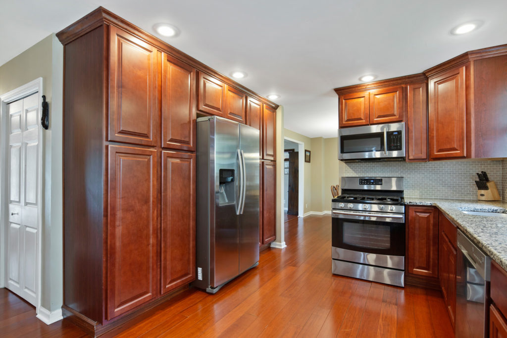 Kitchen has gorgeous stainless steel Samsung appliances.