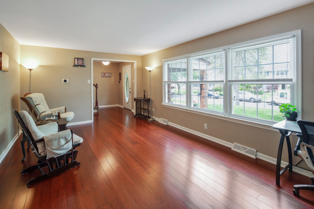 The living room has a tons of natural sunlight. 38 Pennsylvania Avenue Stratford